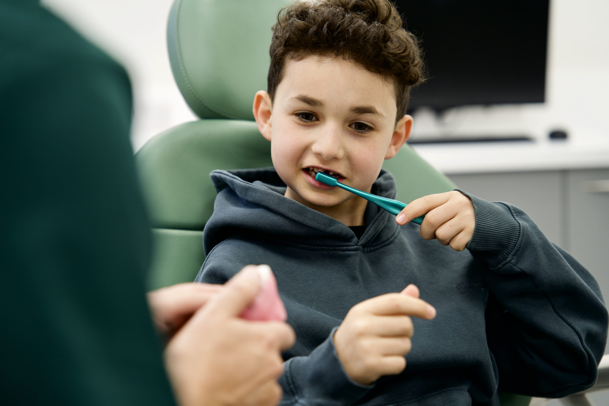 kid brushing teeth